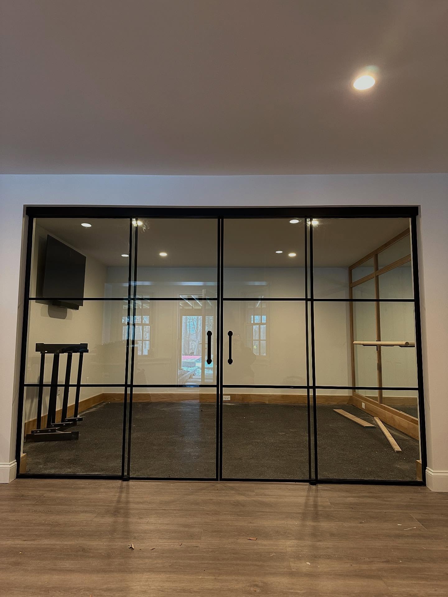 Beautiful craftsmanship on this soft close gym entryway. Shout out to #HMIGLASS for the assist in this gridscape system. #entryway #gridsystem #HMI #glass