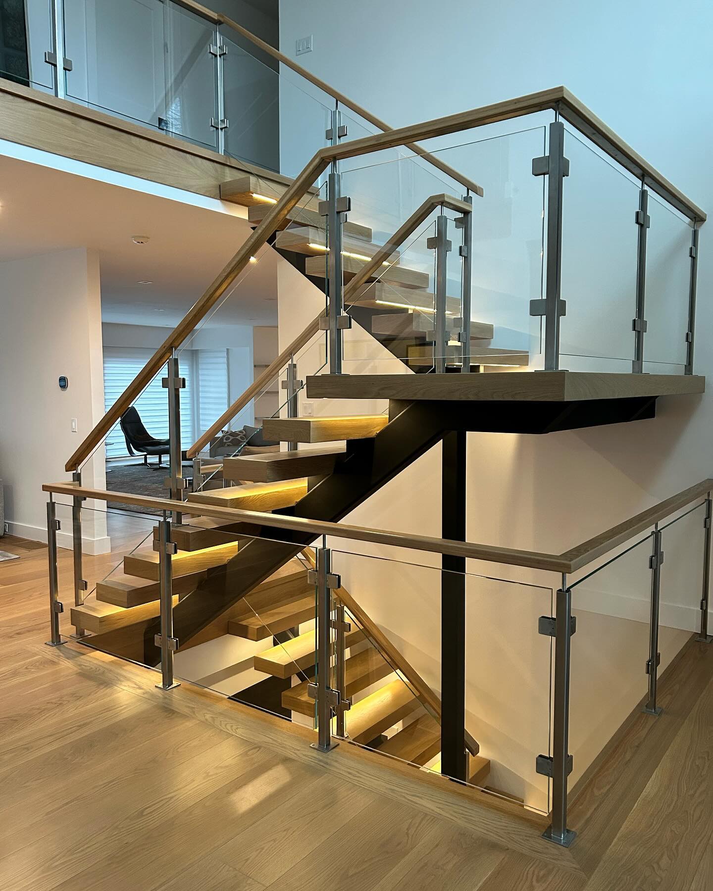 Creating a unique stairwell application can make a massive difference in that wow factor. 1/2” low iron handrail application.